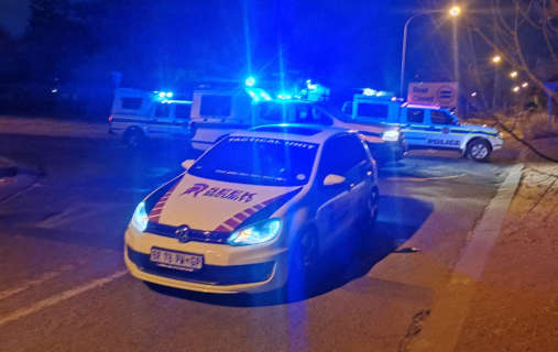 Seek Security response vehicle with emergency lighting on scene at night